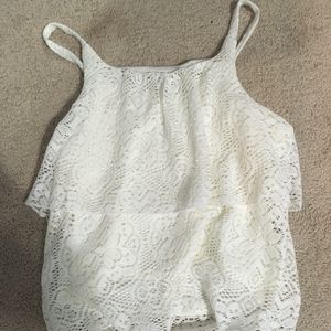 sleeveless white fancy top